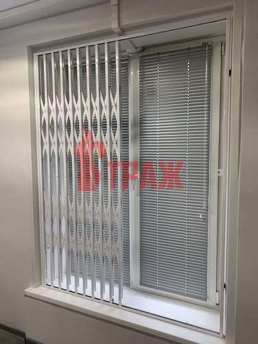 оконная решетка раздвижная из стали
